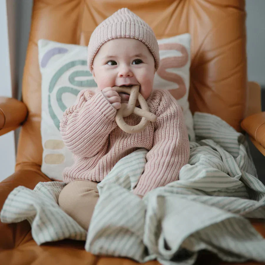Eerste tandjes bij je baby: signalen, symptomen en tips om je baby te helpen