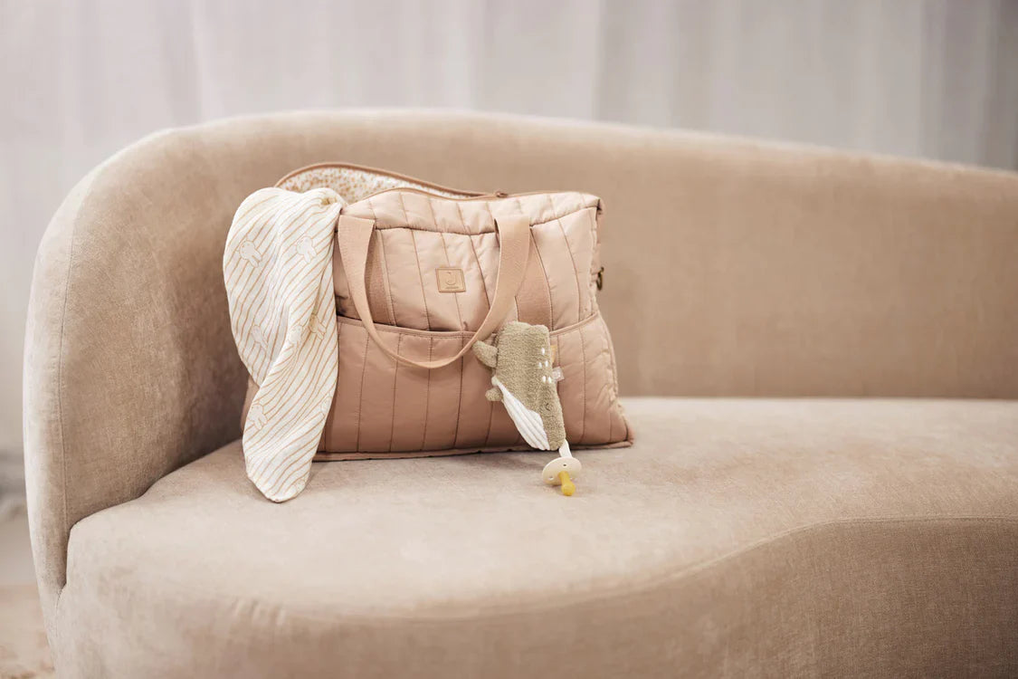 Sfeerfoto van speendoekje in luiertas 
