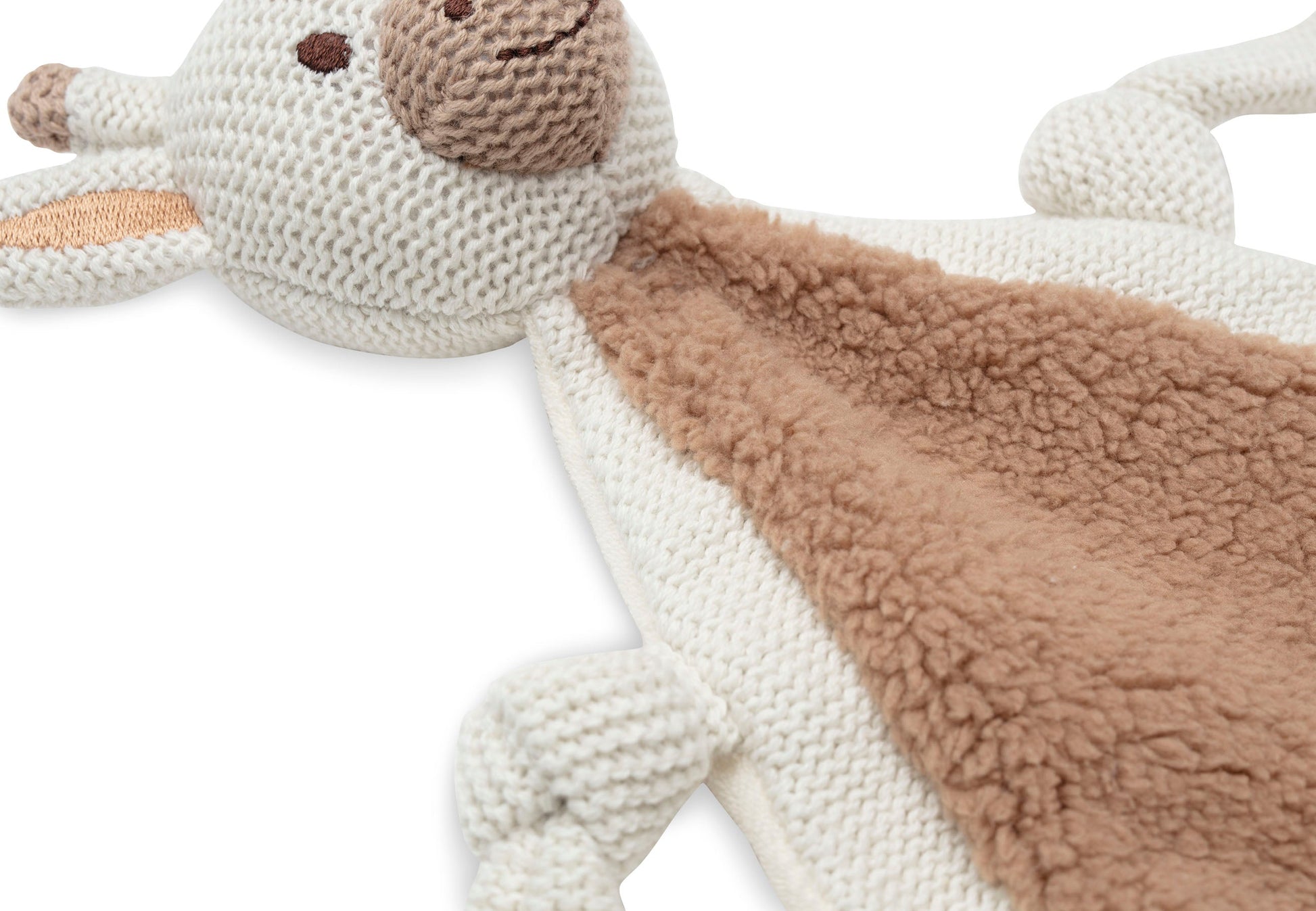 Close-up van gebreid speendoekje giraffe met zachte buik