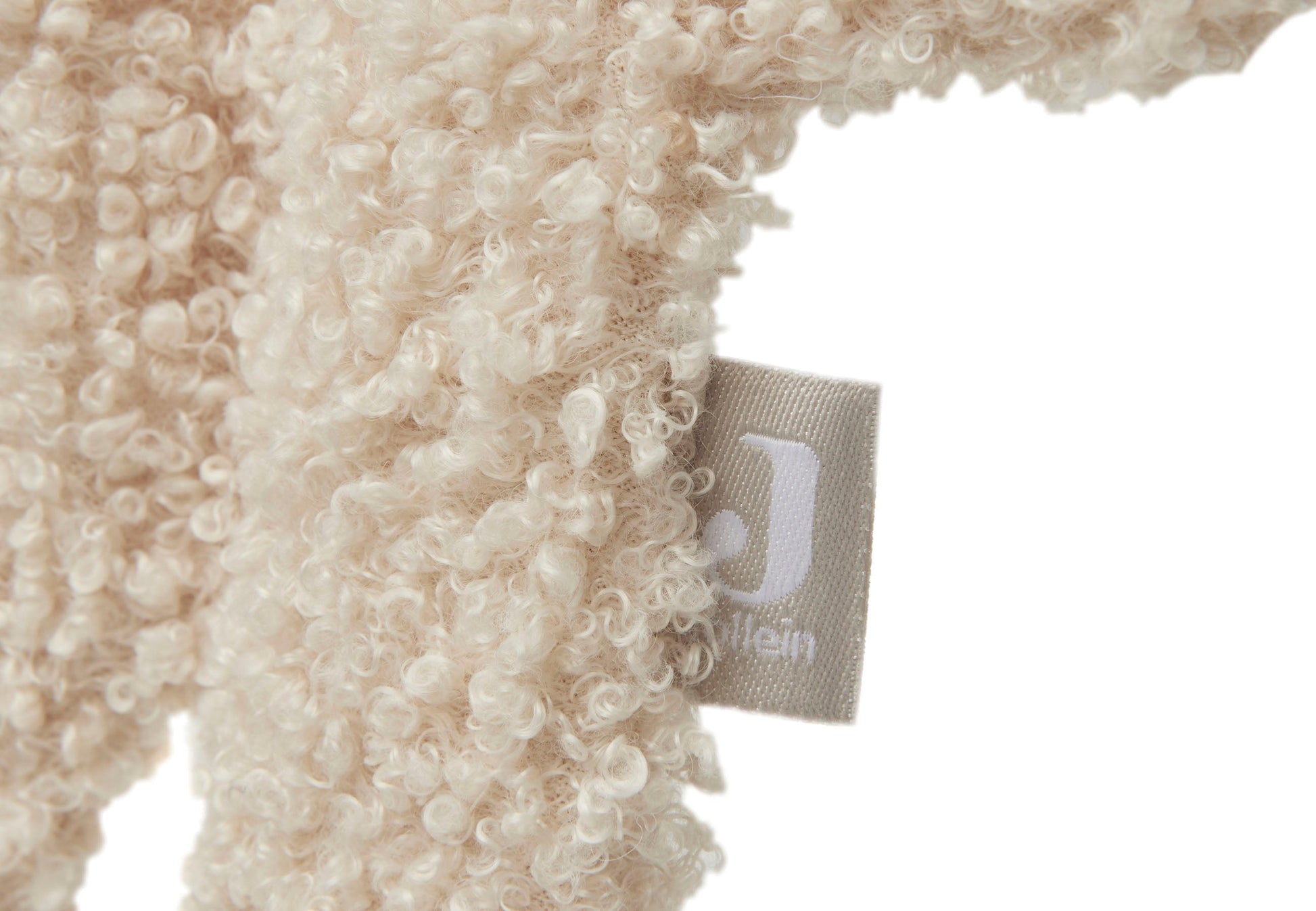 Close-up van speendoekje met zachte teddystof 