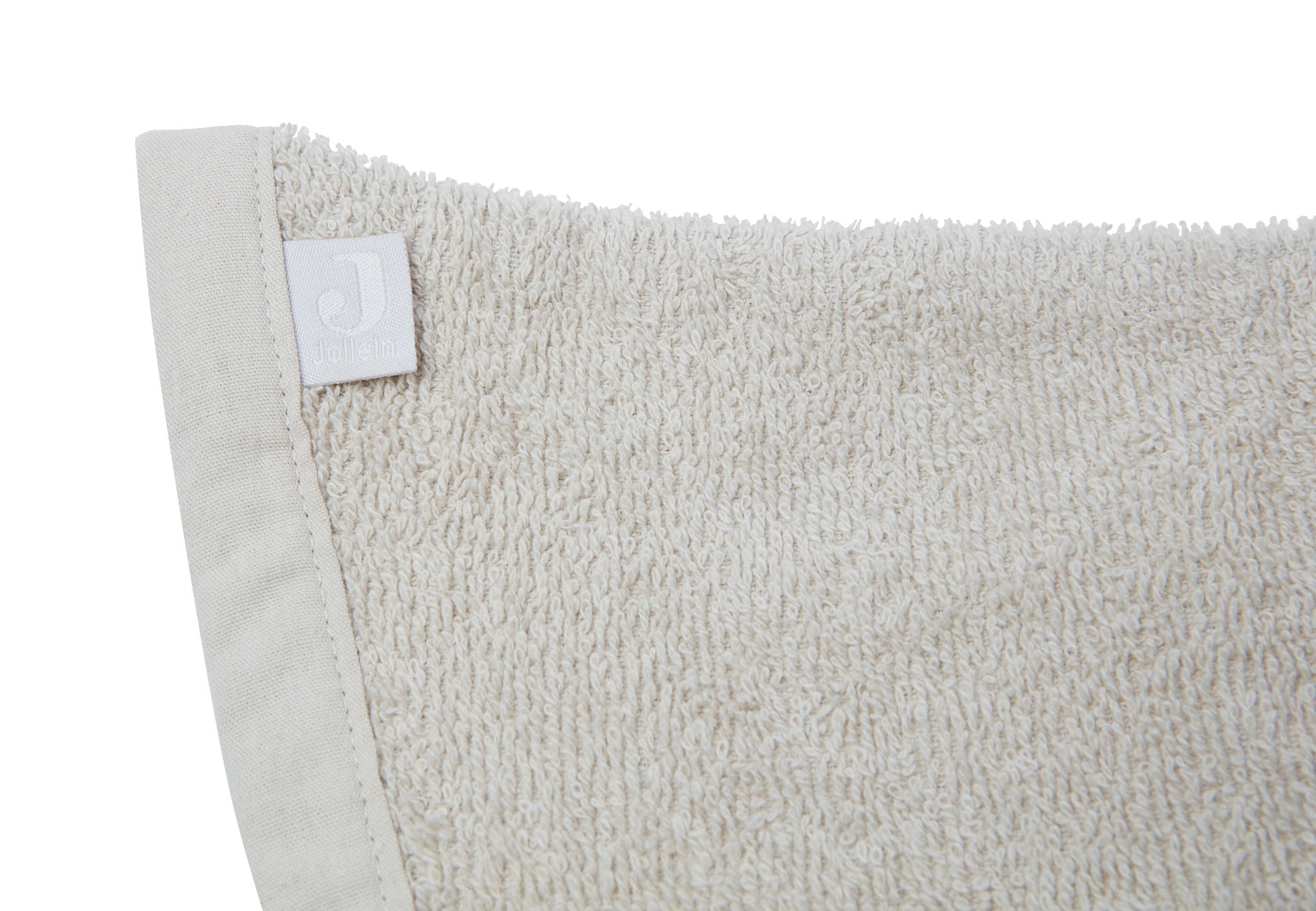 Detail van washand met oortjes in badstof