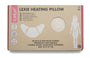 KipKep Lexie Heating Pillow in verpakking, kleur Cookie duidelijk zichtbaar