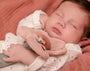Roze bloemenrammelaar van Little Dutch als zacht baby speelgoed voor kleine handjes