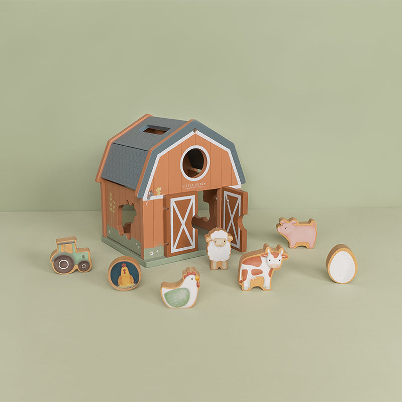 Houten vormen en boerderijdieren van de Little Dutch vormenstoof little farm voor spelenderwijs leren